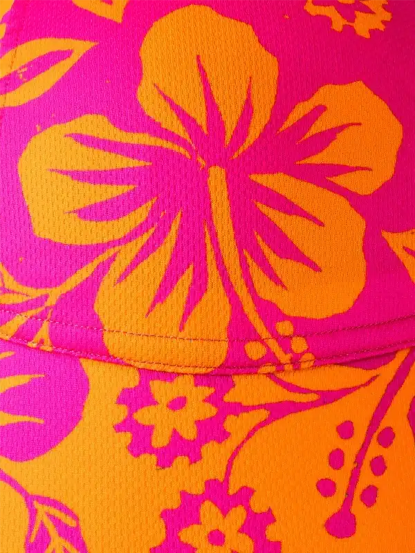 Vibrant pink and orange floral cycling jersey fabric close-up