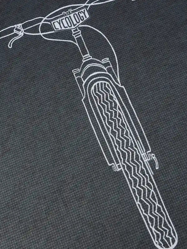 Cycling apparel with white bike graphic on dark textured fabric, featuring 'CYCOLOGY' on handlebars