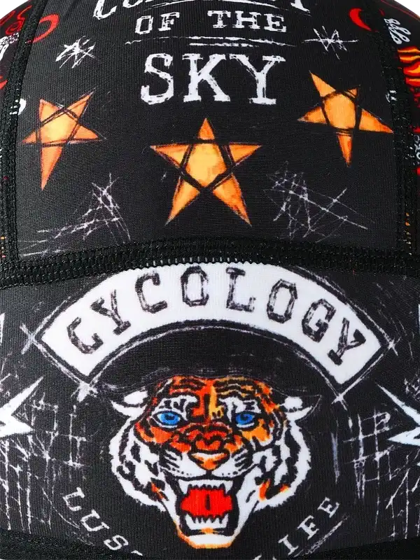 Cycling cap with bold tiger graphic, stars, and 'Cycology' text on black fabric for road bike riders