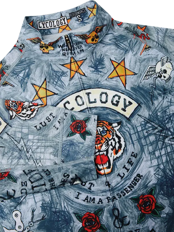 Cycling jersey with tattoo-style graphics and text on a blue background