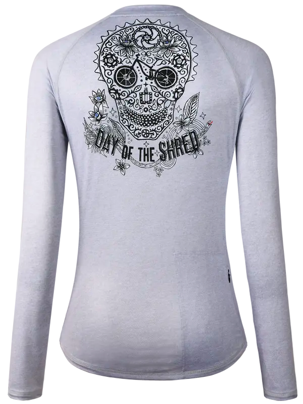 Day of The Shred Grey Women's Long Sleeve MTB Jersey with a black skull design and 'Day of the Shred' text on the back.