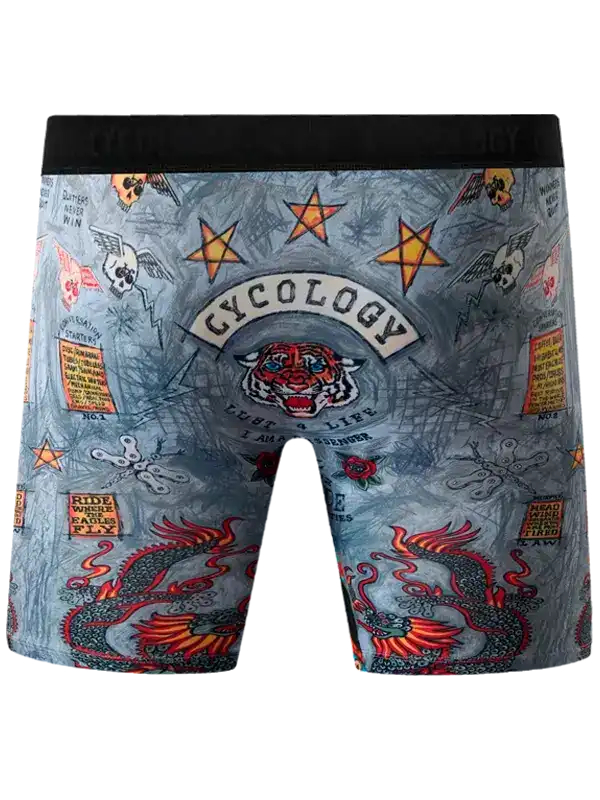 Men's cycling shorts with bold tiger, dragon, and star print design on gray fabric