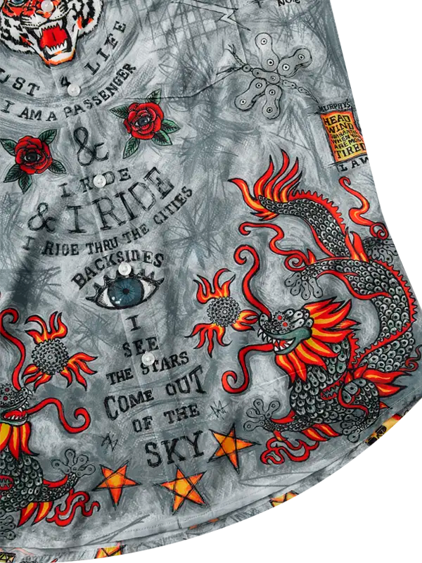 Grey fabric close up with red dragon design and text