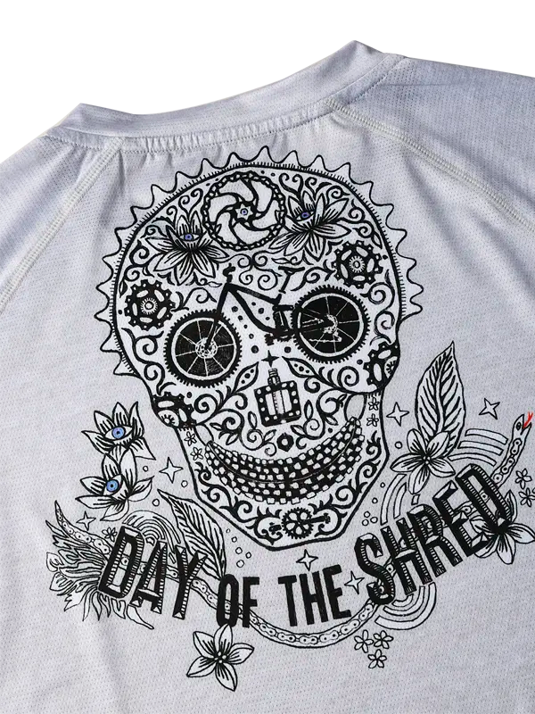 Day of The Shred Grey Women's Long Sleeve MTB Jersey with a black skull design and 'Day of the Shred' text