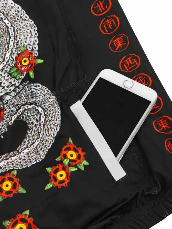 Black cycling shorts with chain and gear print, phone pocket, and Chinese character details