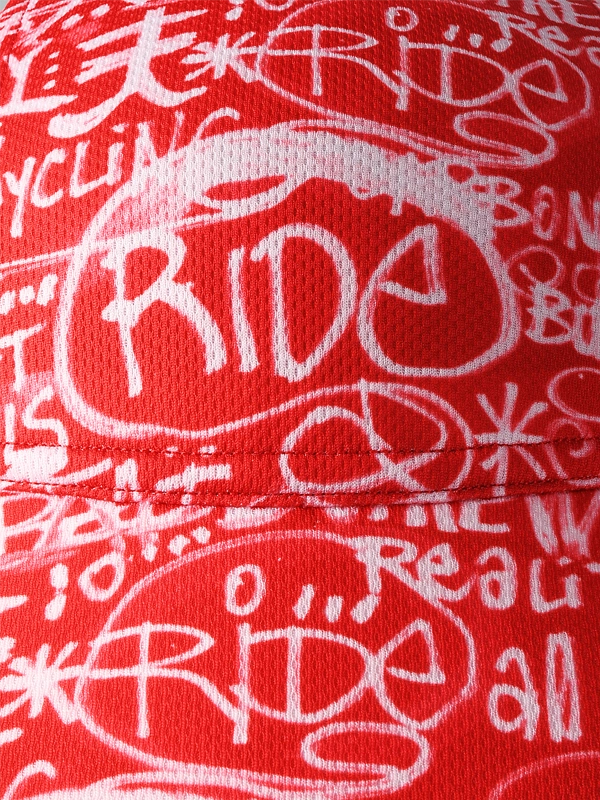 Red cycling cap with white 'RIDE' text and graphics