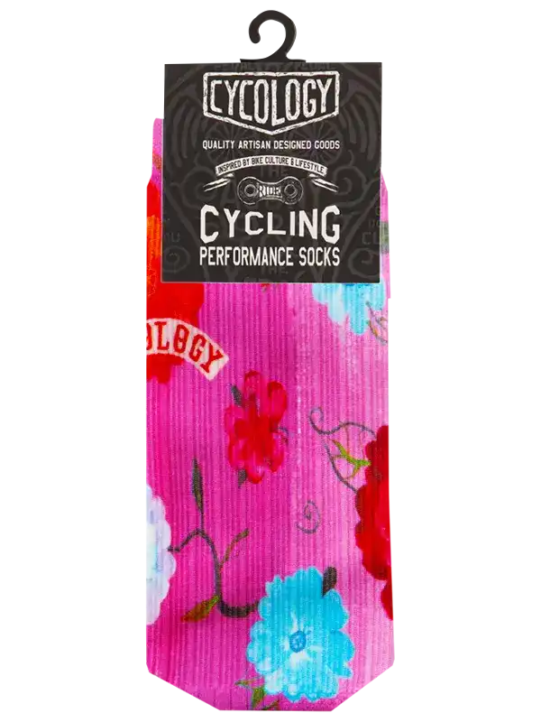 Pink floral cycling performance socks with vibrant blooms and brand tag