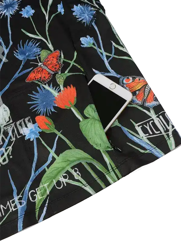 Black cycling shorts with floral and butterfly print, phone in side pocket, stylish active wear