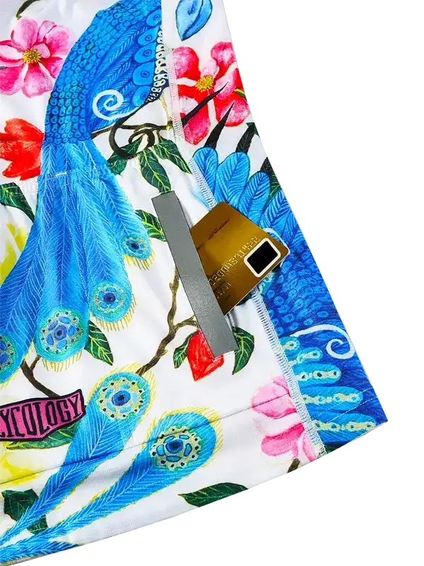 Women's cycling shorts with peacock feather and floral print, featuring secure zip pocket for essentials