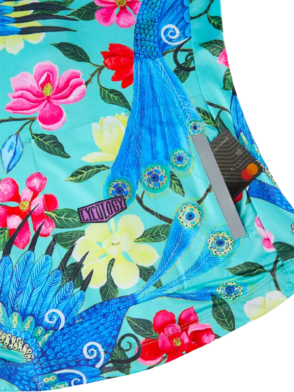 Colorful  Goddess Blue Women's Reborn Cycling Jersey with floral and peacock design on a turquoise background