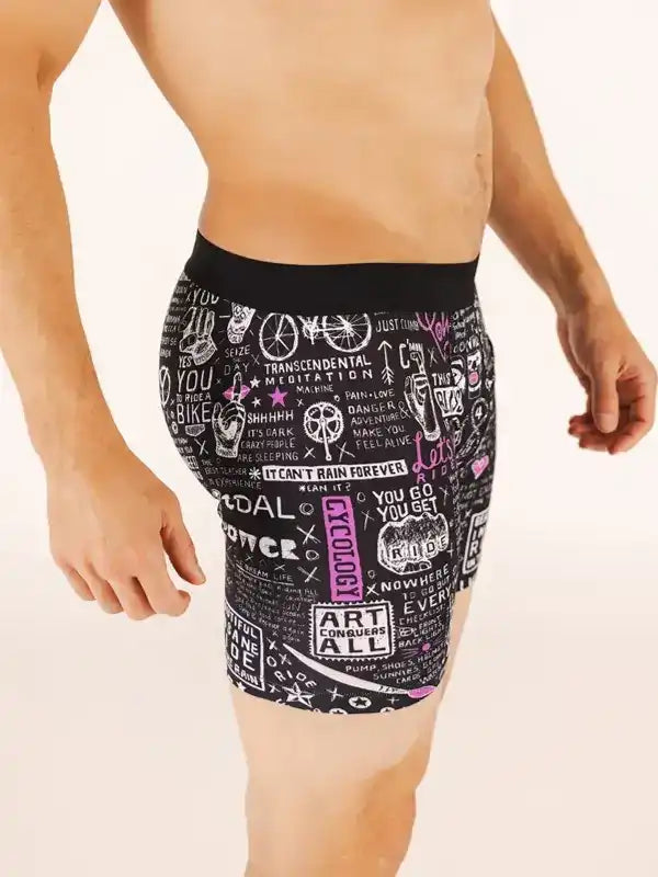 Men's cycling shorts with bold graphic print, featuring motivational phrases and cycling icons for active rides.