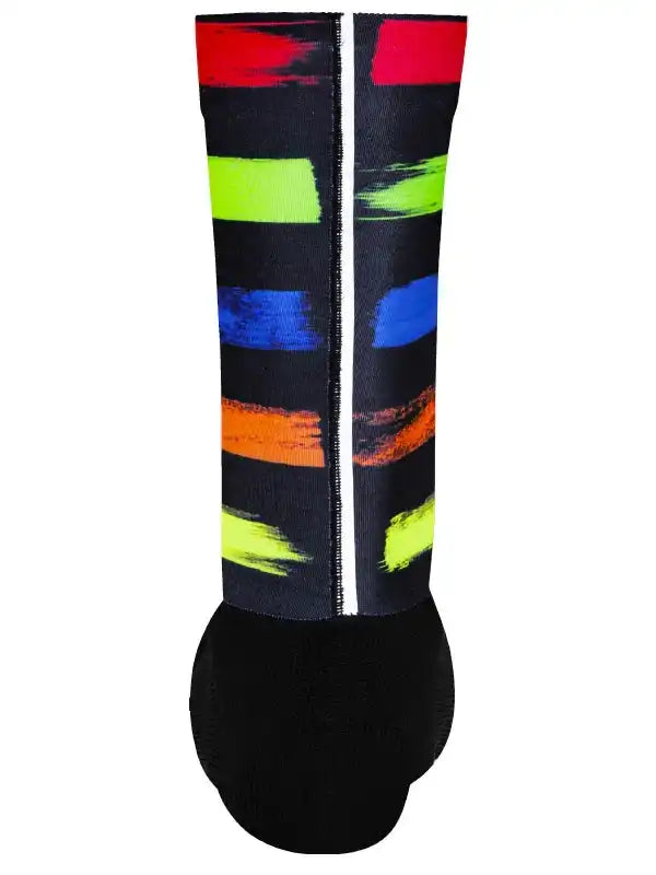 Colorful cycling socks with bold brushstroke stripes in red, green, blue, orange, and yellow on black background
