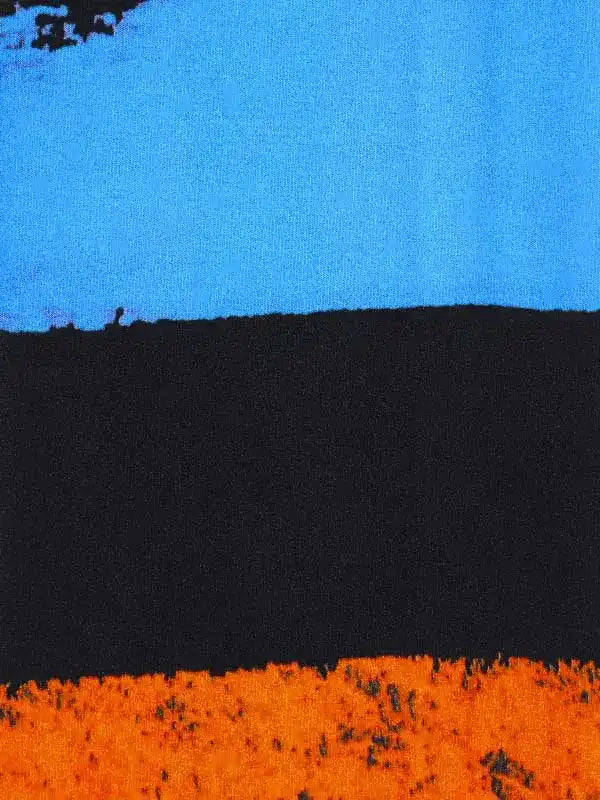 Bold blue, black, and orange abstract design on cycling apparel fabric