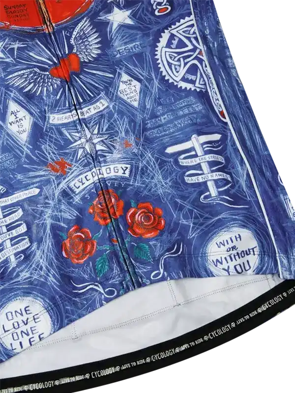 Blue cycling jersey with roses, stars, and motivational phrases, featuring 'Cycology' branding and unique graphic design.