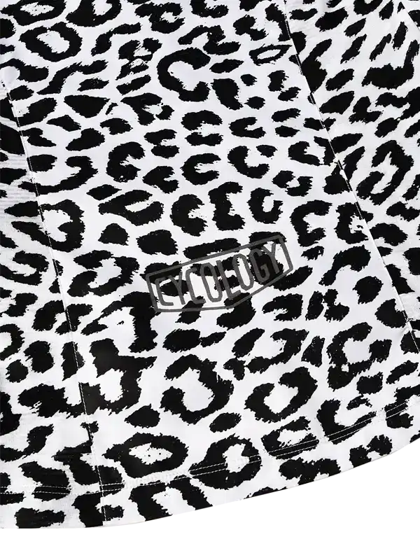Black and white leopard print cycling jersey with bold graphic logo detail