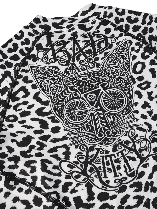 Women's cycling jersey with leopard print and 'Bad Ass Kitty' graphic design