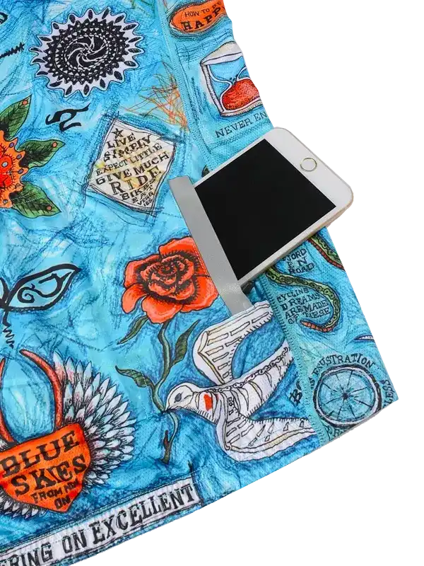 Blue cycling jersey with floral, dove, and motivational print design, featuring phone pocket detail