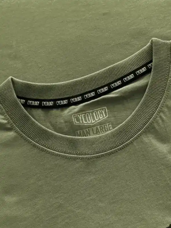 Olive green men's cycling t-shirt with branded neck tape and size label, made from quality fabric.