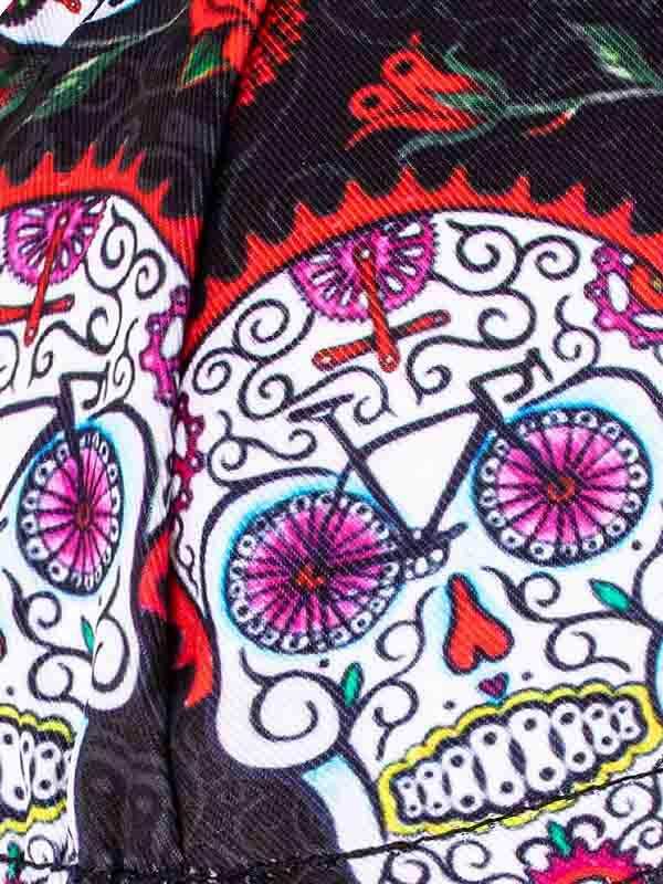 Vibrant sugar skull cycling shorts with pink bike wheels, floral accents, and bold Day of the Dead design