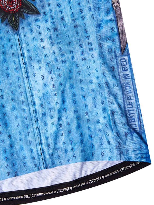 Blue cycling jersey with wolf and rose design