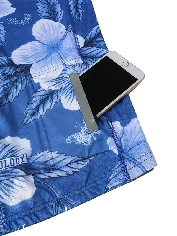 Blue floral cycling shorts with phone pocket, ideal for active rides and outdoor adventures.