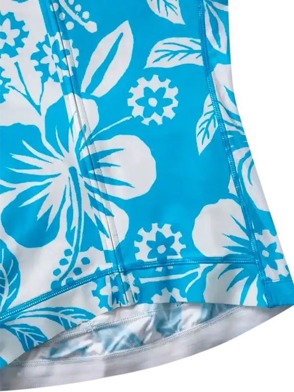 Blue and white floral cycling shorts with tropical hibiscus print and reflective hem detail