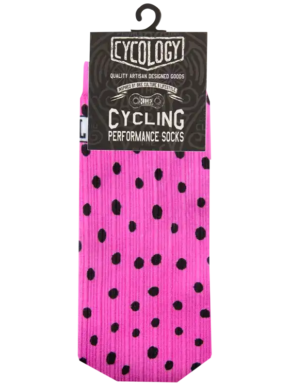 Pink cycling performance socks with black polka dots, artisan designed for bike culture