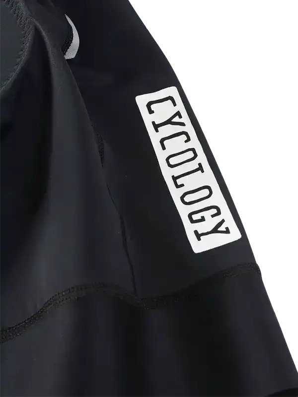 Black cycling jersey sleeve with white Cycology logo, high-quality fabric detail