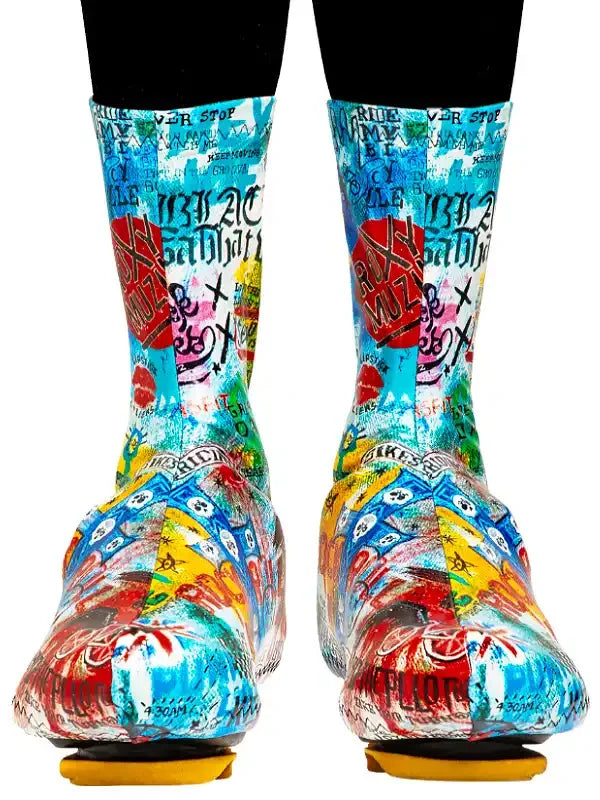 Colorful graffiti-style cycling socks with bold patterns and text, designed for men and women riders.