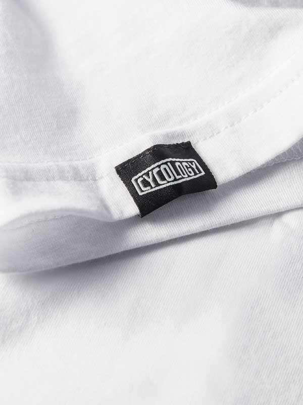 White cycling jersey with black Cycology brand tag, high-quality fabric detail