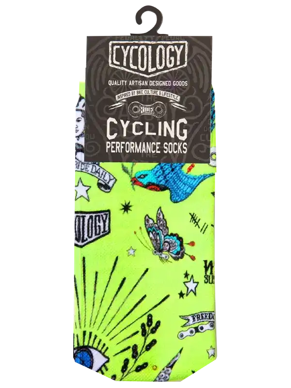 Bright neon green cycling performance socks with tattoo-style graphics, stars, and butterfly designs