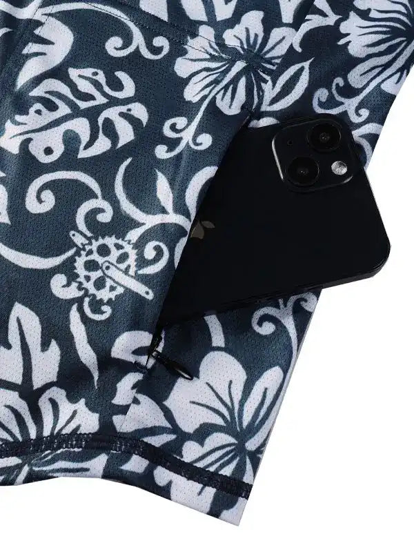 Cycling jersey with floral pattern and rear pocket holding smartphone, ideal for bike rides