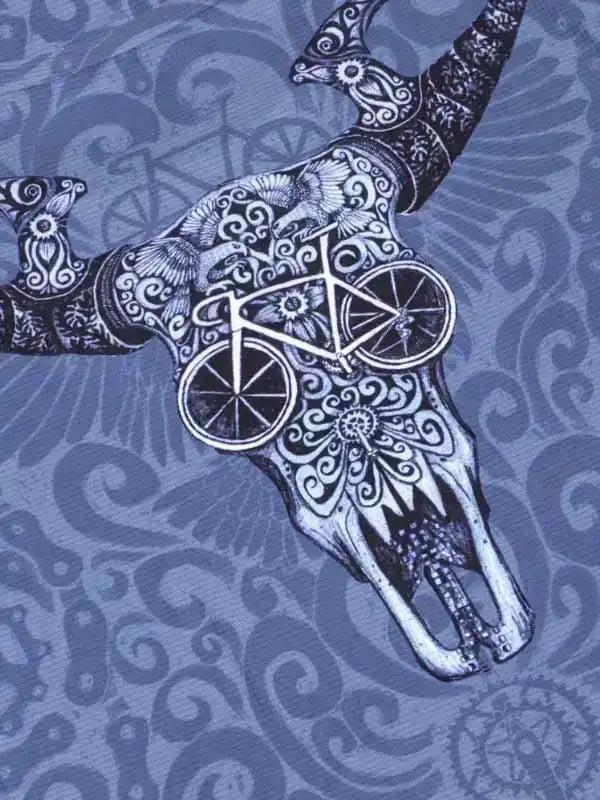 Blue cycling apparel with ornate bull skull and bike graphic design