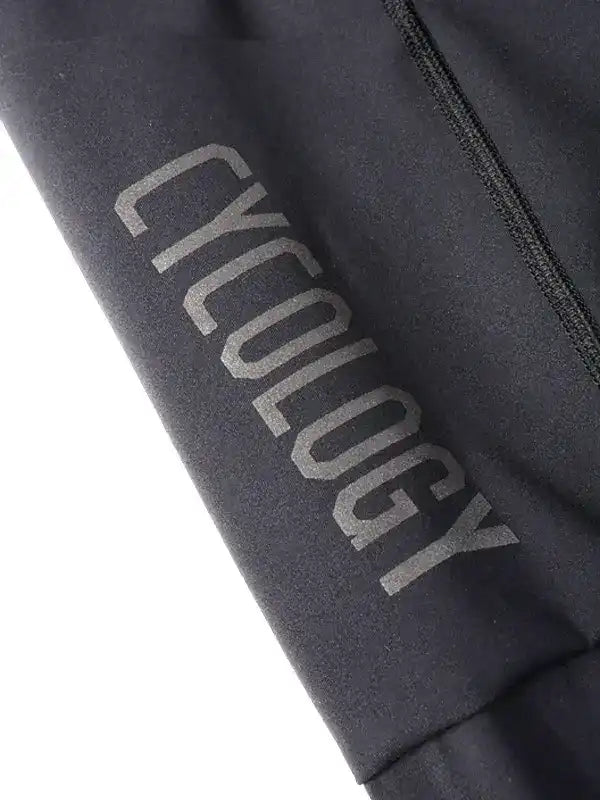 Black cycling apparel with 'CYCOLOGY' logo, high-quality fabric for men's and women's rides