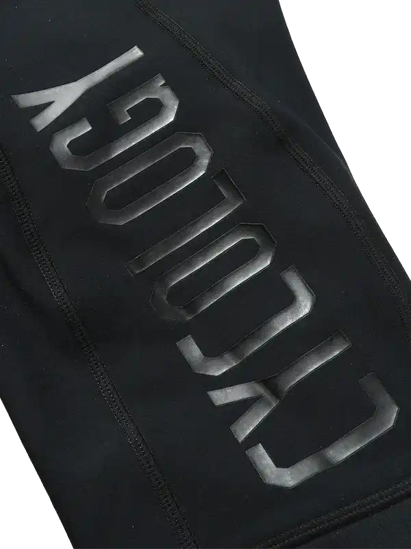 Black cycling jersey with bold 'CYCOLOGY' logo, high-quality fabric, men's and women's bike wear