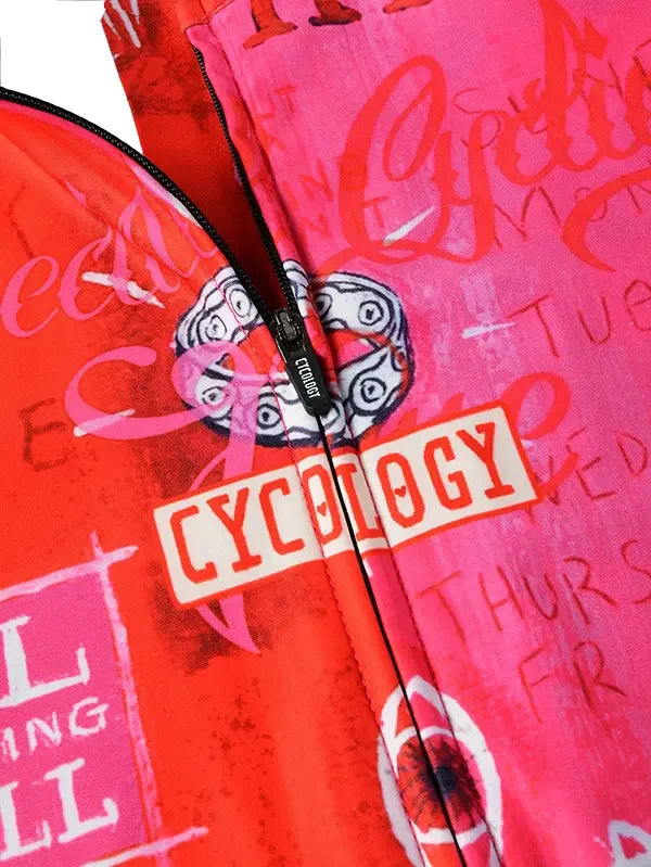 Vibrant red and pink cycling jersey with 'CYCOLOGY' graphic print and zipper detail