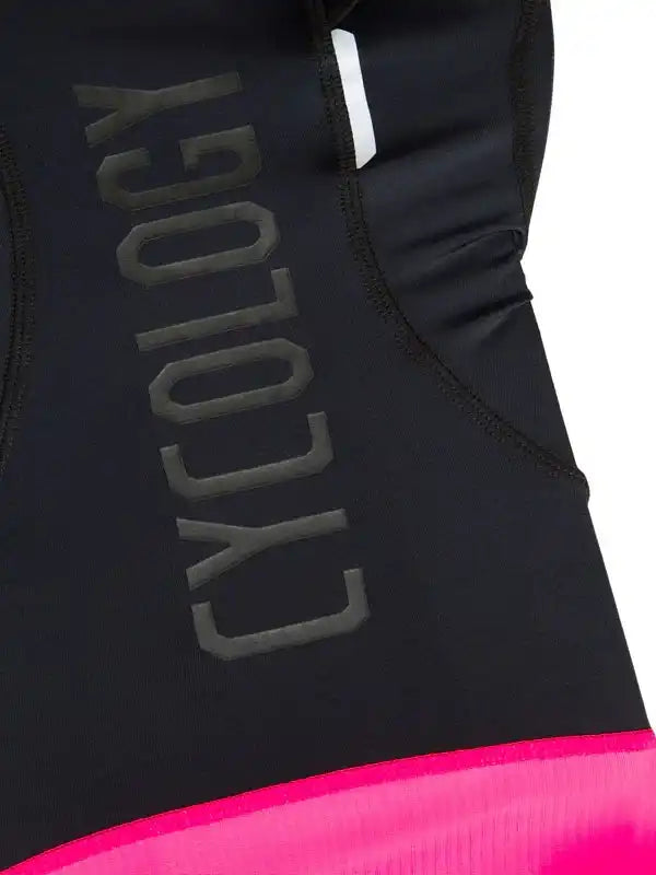 Black cycling jersey with bold 'CYCOLOGY' text and vibrant pink hem, showcasing performance fabric design.