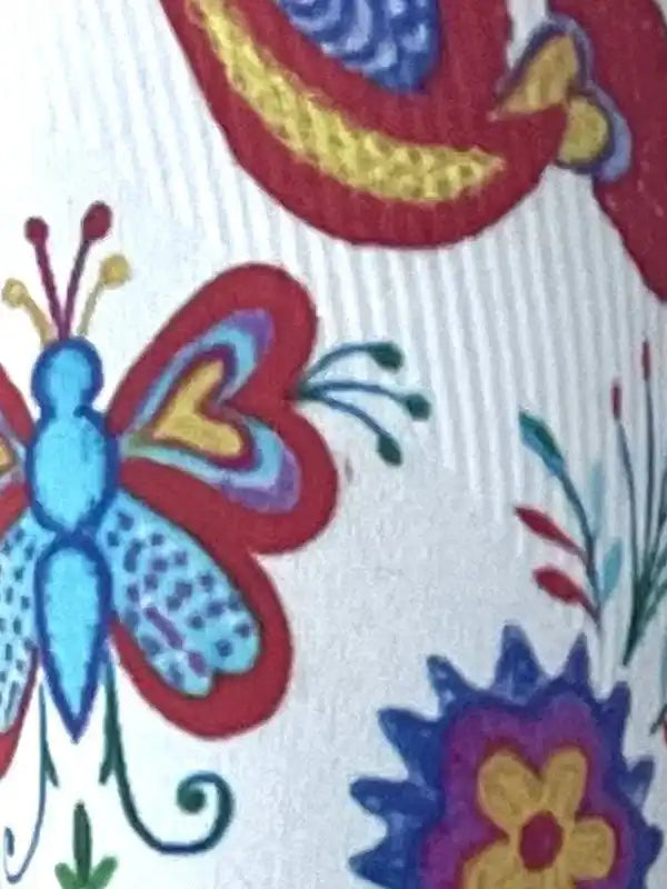 Colorful butterfly and floral print on cycling apparel fabric, vibrant design for women's or men's bike wear