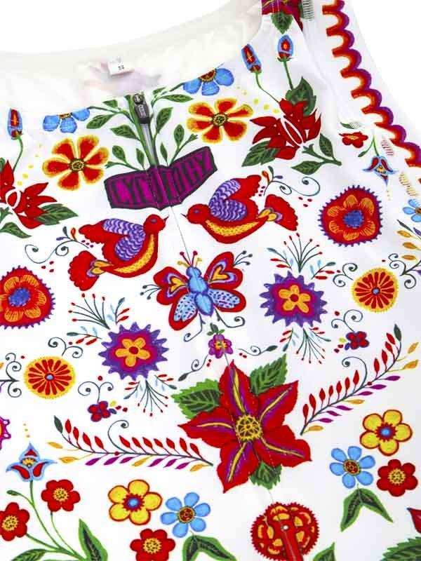 Vibrant floral and bird print cycling jersey with colorful embroidery details