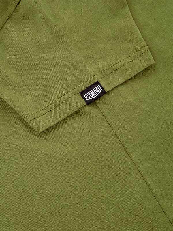 Olive green cycling jersey with branded tag, showcasing high-quality fabric and stitching detail for men's and women's rides.