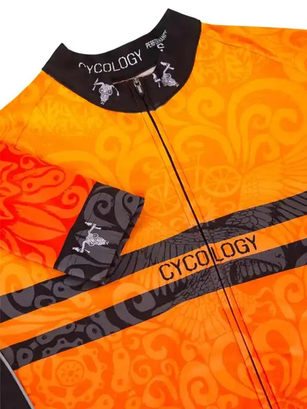 Vibrant orange cycling jersey with bold swirl patterns and black accents, featuring zipper and brand details.