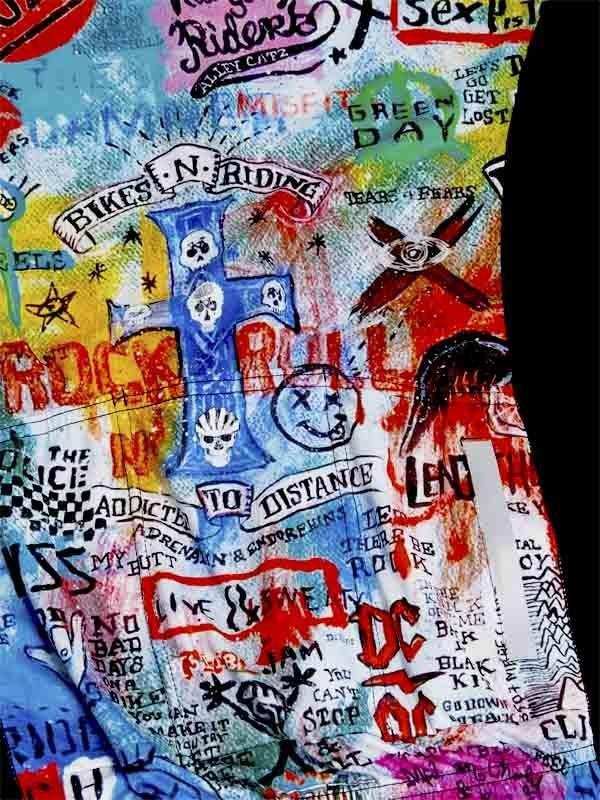 Vibrant rock-themed cycling jersey with skulls, band names, and graffiti-style graphics for men and women.