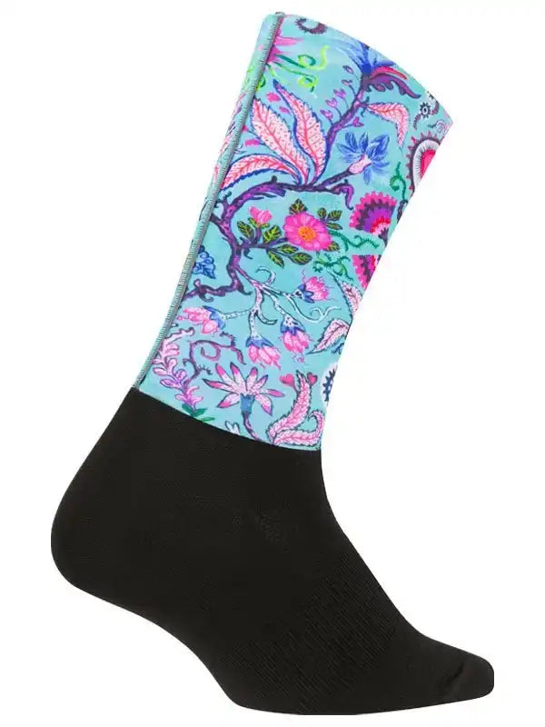 Cycling sock with vibrant floral pattern on teal background, black foot section, designed for comfort and style.
