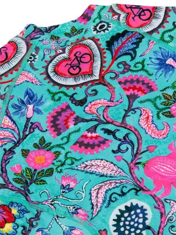 Vibrant turquoise cycling jersey with pink heart bike print and floral paisley pattern, ideal for women's road cycling wear.