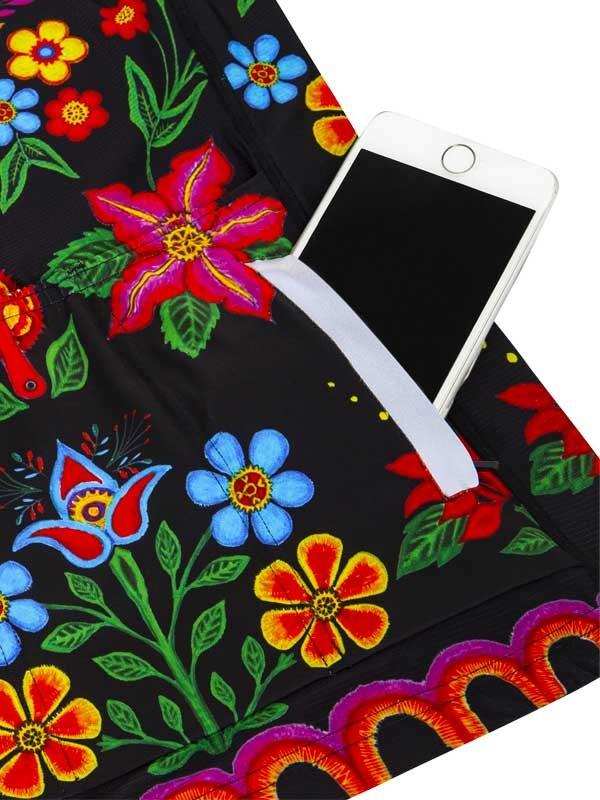Black cycling shorts with vibrant floral embroidery and phone pocket, perfect for women's bike rides.