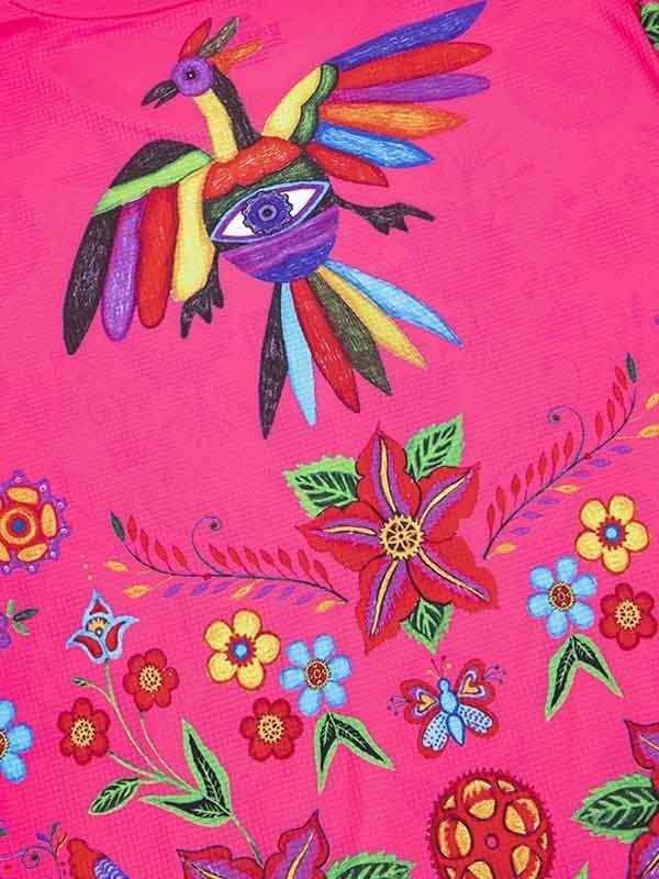 Vibrant pink cycling jersey with colorful bird and floral print design