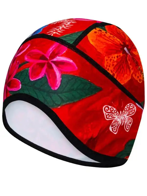 Vibrant floral cycling cap with pink flowers, green leaves, and white butterfly on red background