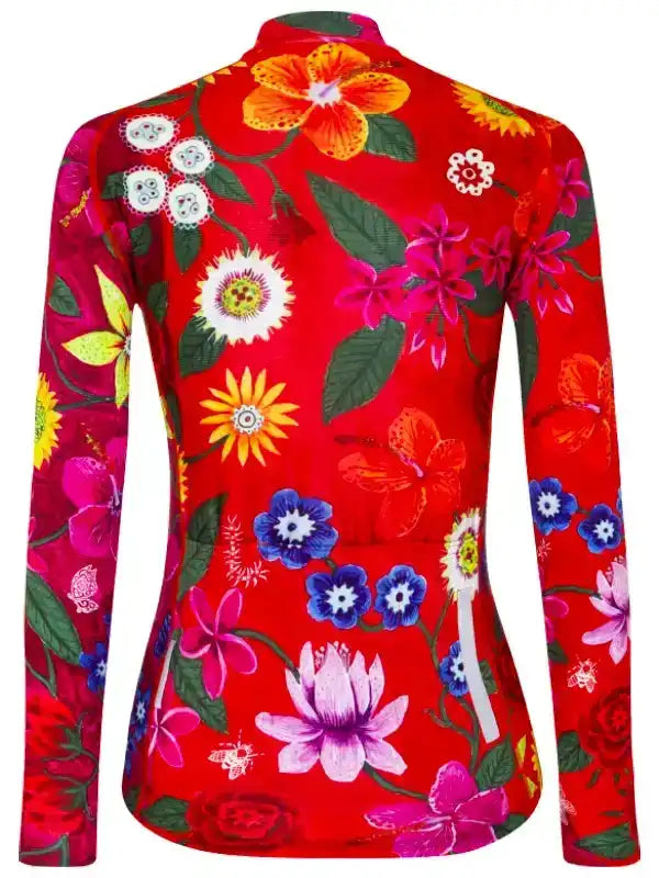 Vibrant red women's cycling jersey with colorful floral print, long sleeves, and reflective strip
