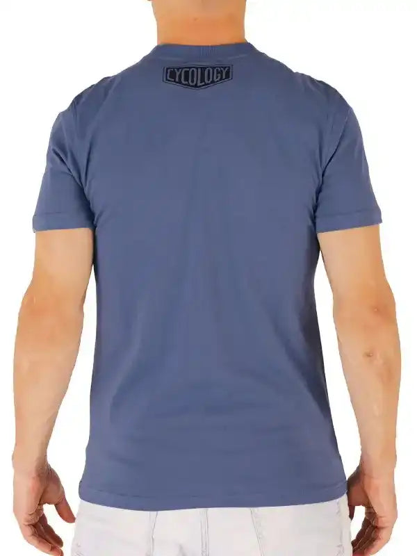 Men's blue cycling t-shirt with subtle back logo, ideal for casual or ride wear