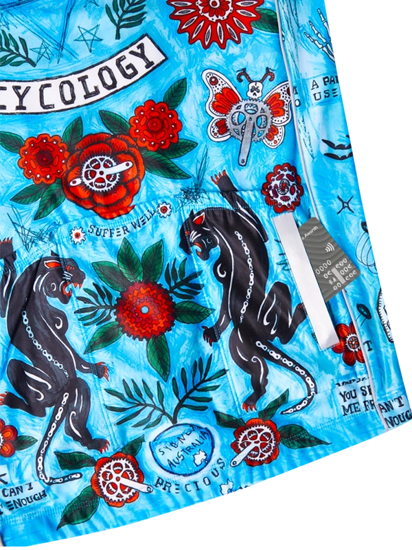 Colorful jersey with panther designs, flowers, and text on a blue background